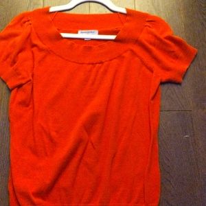 orange fitted blouse